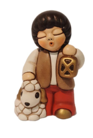 Thun Krippenfigur Kind mit Schaf und Laterne Ein leuchtender Moment voller Frieden und Hoffnung