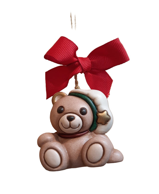 Christbaumschmuck Teddy mit Kochmütze und Stern von Thun – handbemalter Keramikanhänger als festliche Weihnachtsdekoration.
