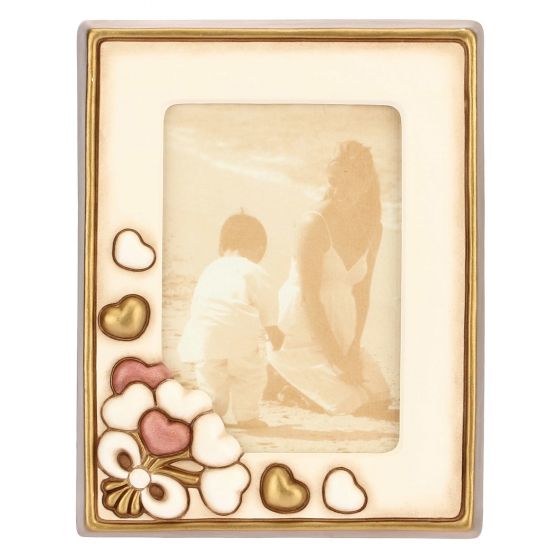 C2369H90 Fotorahmen mit Herzen, Format 10x15 cm  „Dieses Produkt ist zur Zeit nicht am Lager. Bitte setzen Sie sich mit uns in Verbindung damit wir Ihnen den nächst möglichen Liefertermin bekannt geben können.“