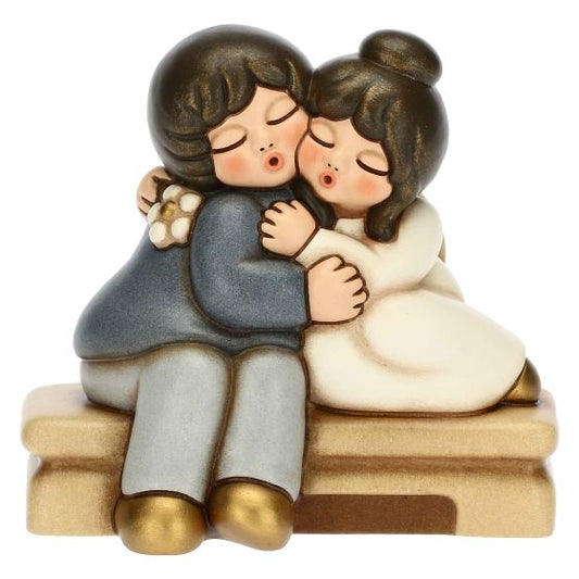 F3248H90B Sitting bride and groom embrace large  "This product is currently out of stock. Please contact us so that we can inform you of the next possible delivery date."