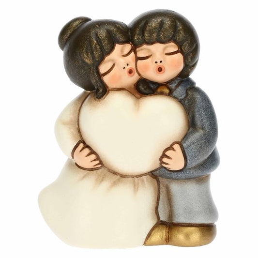 F3249H90B Sitting bride and groom embrace small  "This product is currently out of stock. Please contact us so that we can inform you of the next possible delivery date."