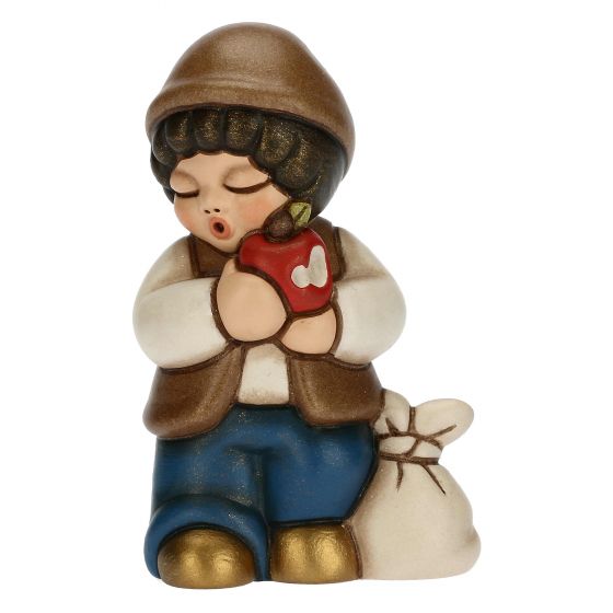 Krippenfigur Kind mit Apfel zur klassischen Krippe von Thun in blau