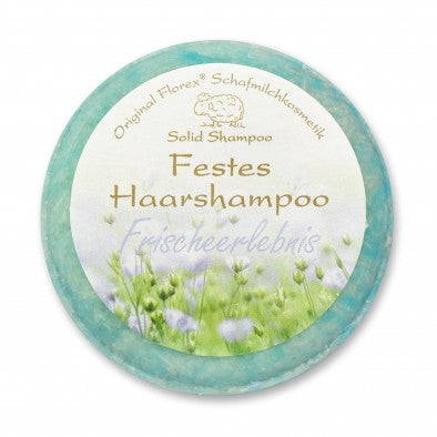 Alt-Text: Mildes Pflege-Shampoo mit Honigextrakt, Kakaobutter und Schafmilch für geschmeidiges und glänzendes Haar